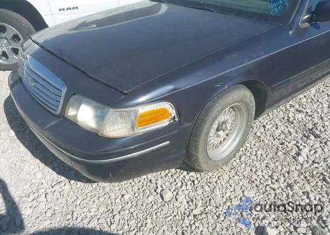 2001 Ford Crown Victoria Lx z USA, uszkodzony, nr VIN 2FAFP74W31X134040